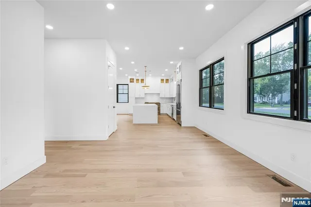a view of kitchen with furniture and window