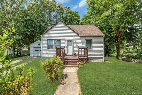 $449,000 | 96 Washington Drive, Mastic Beach, NY 11951