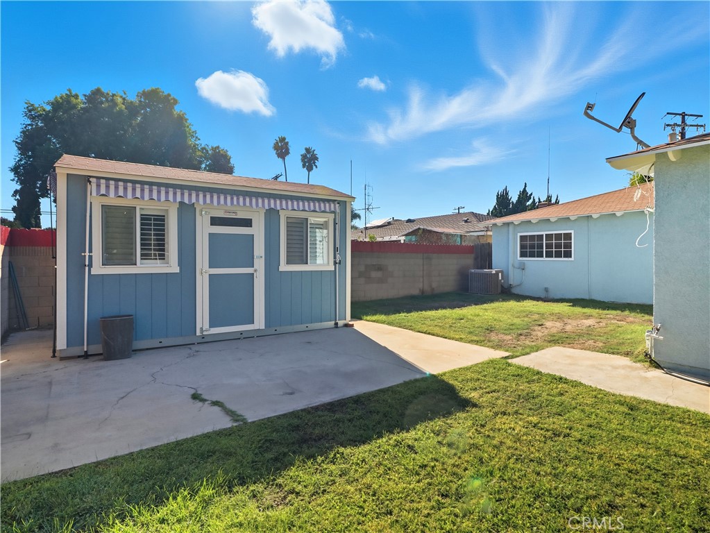 10930 Rio Hondo Drive Downey, CA 90241 - Photo 23 of 30 a view of an house with backyard and a garden