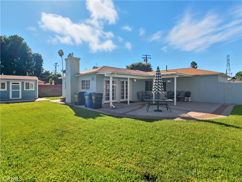10930 Rio Hondo Drive Downey, CA 90241 - Photo 24 of 30 a view of a house with a yard porch and sitting area