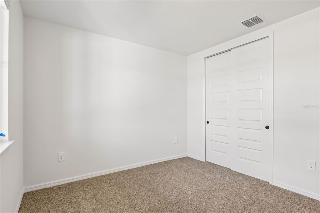 3335 Orchard Loop Bartow, FL 33830 - Photo 17 of 47 a view of an empty room
