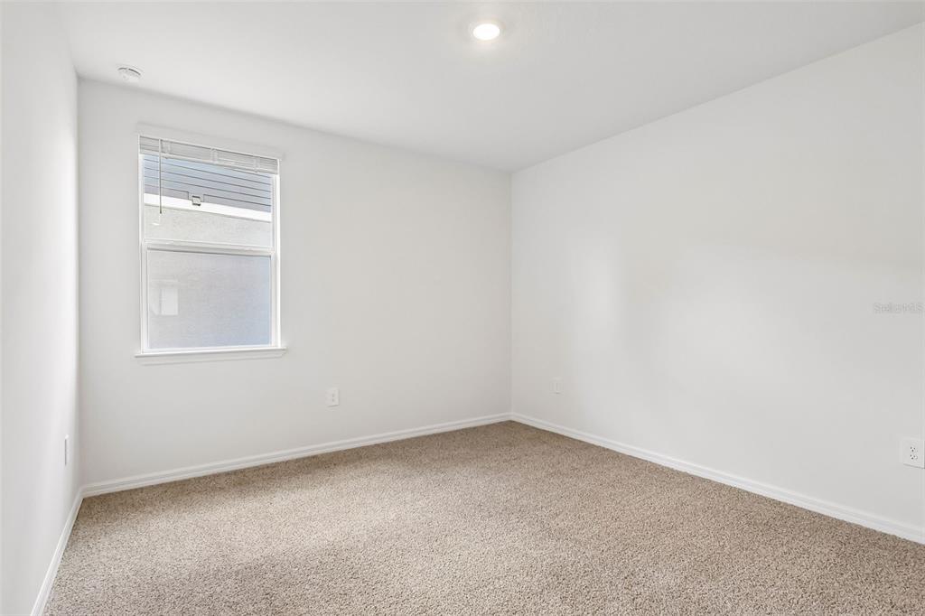 3335 Orchard Loop Bartow, FL 33830 - Photo 21 of 47 an empty room with a window