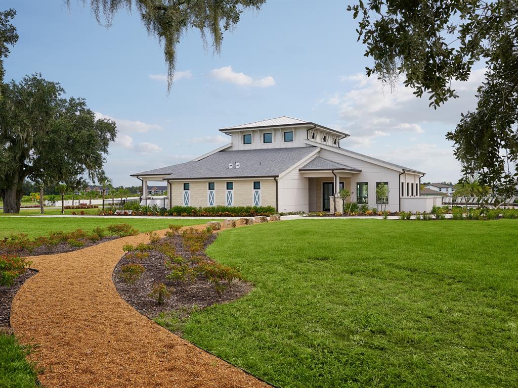3335 Orchard Loop Bartow, FL 33830 - Photo 39 of 47 a view of an house with swimming pool and yard