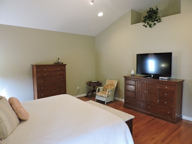 83 Willow Spout Road Fort Defiance, VA 24437 - Photo 11 of 48 a bedroom with a bed and a flat screen tv
