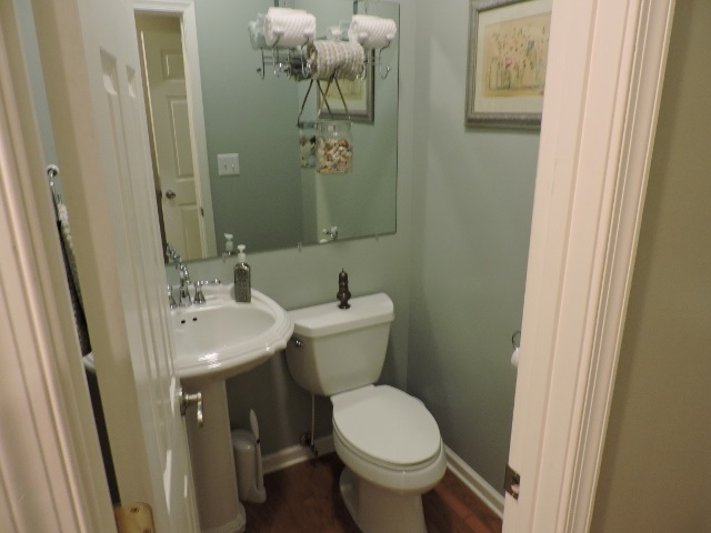83 Willow Spout Road Fort Defiance, VA 24437 - Photo 16 of 48 a bathroom with a sink and mirror with toilet