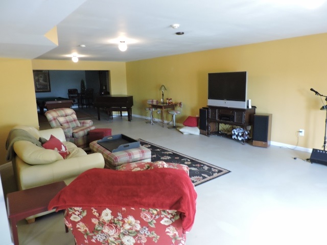 83 Willow Spout Road Fort Defiance, VA 24437 - Photo 27 of 48 a living room with furniture and a flat screen tv