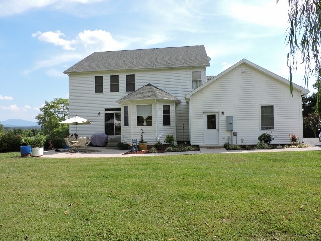 83 Willow Spout Road Fort Defiance, VA 24437 - Photo 36 of 48 a front view of a house with a yard and garage