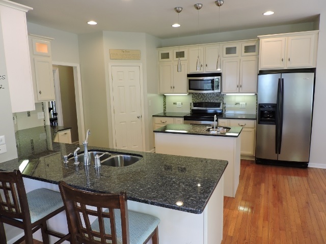 83 Willow Spout Road Fort Defiance, VA 24437 - Photo 7 of 48 a kitchen with stainless steel appliances granite countertop a sink refrigerator and microwave