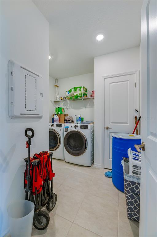 365 River Front Way Edgewater, FL 32141 - Photo 20 of 34 a utility room with sink dryer and washer