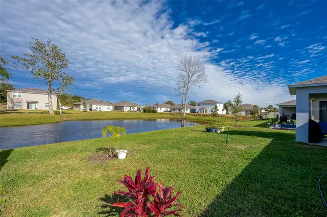 a view of a garden with houses
