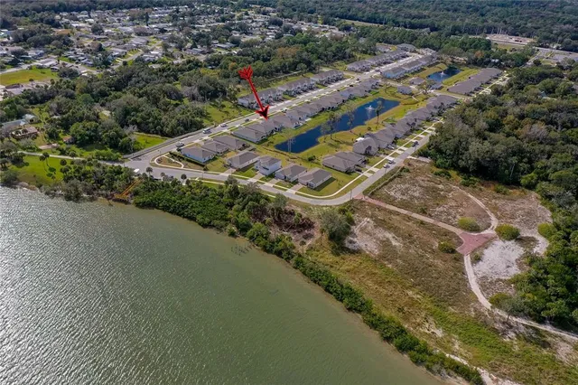 an aerial view of a house with a garden
