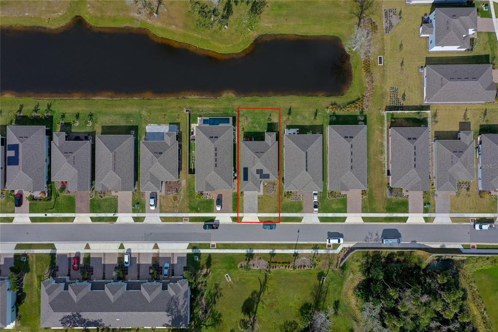 365 River Front Way Edgewater, FL 32141 - Photo 3 of 34 a building with trees in front of it