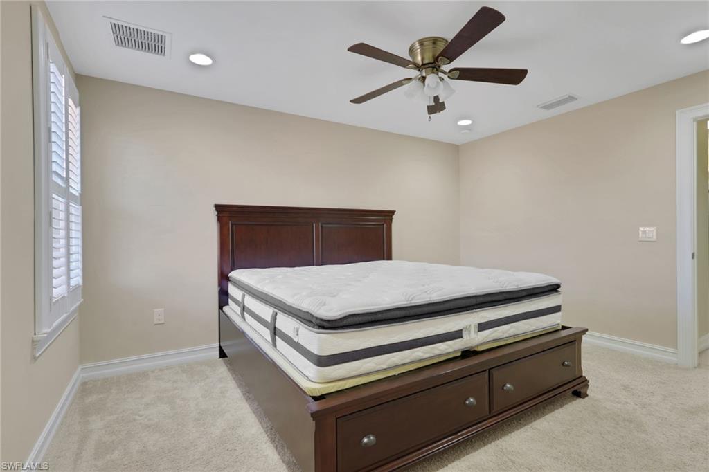 16309 Aberdeen Way Naples, FL 34110 - Photo 26 of 34 a room with storage and utility