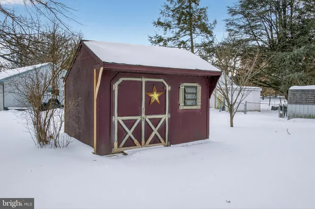 a house with trees in front of it