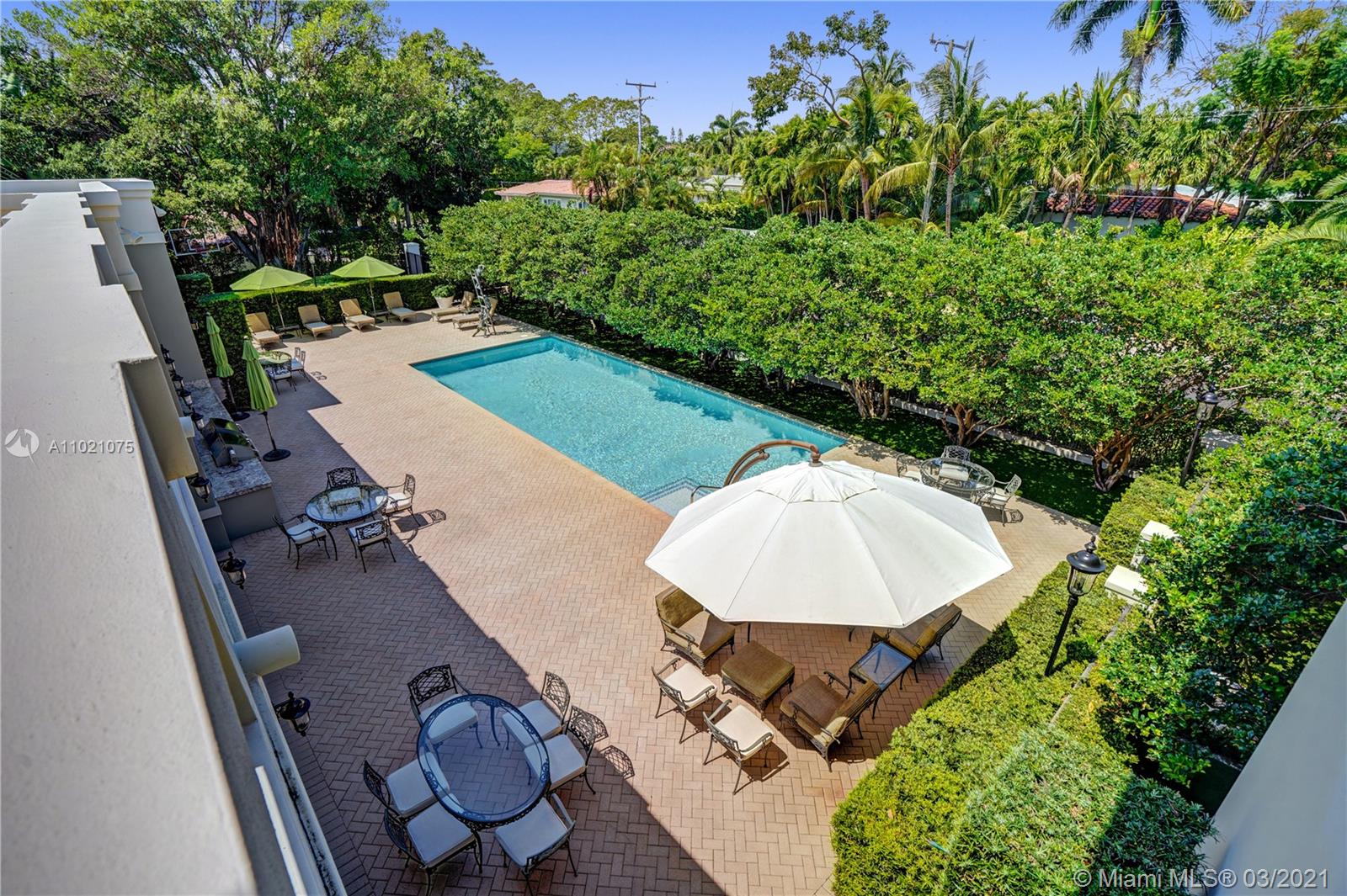 3014 Pine Tree Drive Miami Beach, FL 33140 - Photo 31 of 43 an aerial view of a house having patio