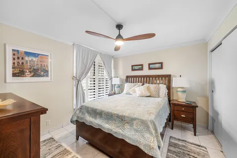 a view of a swimming pool with outdoor seating