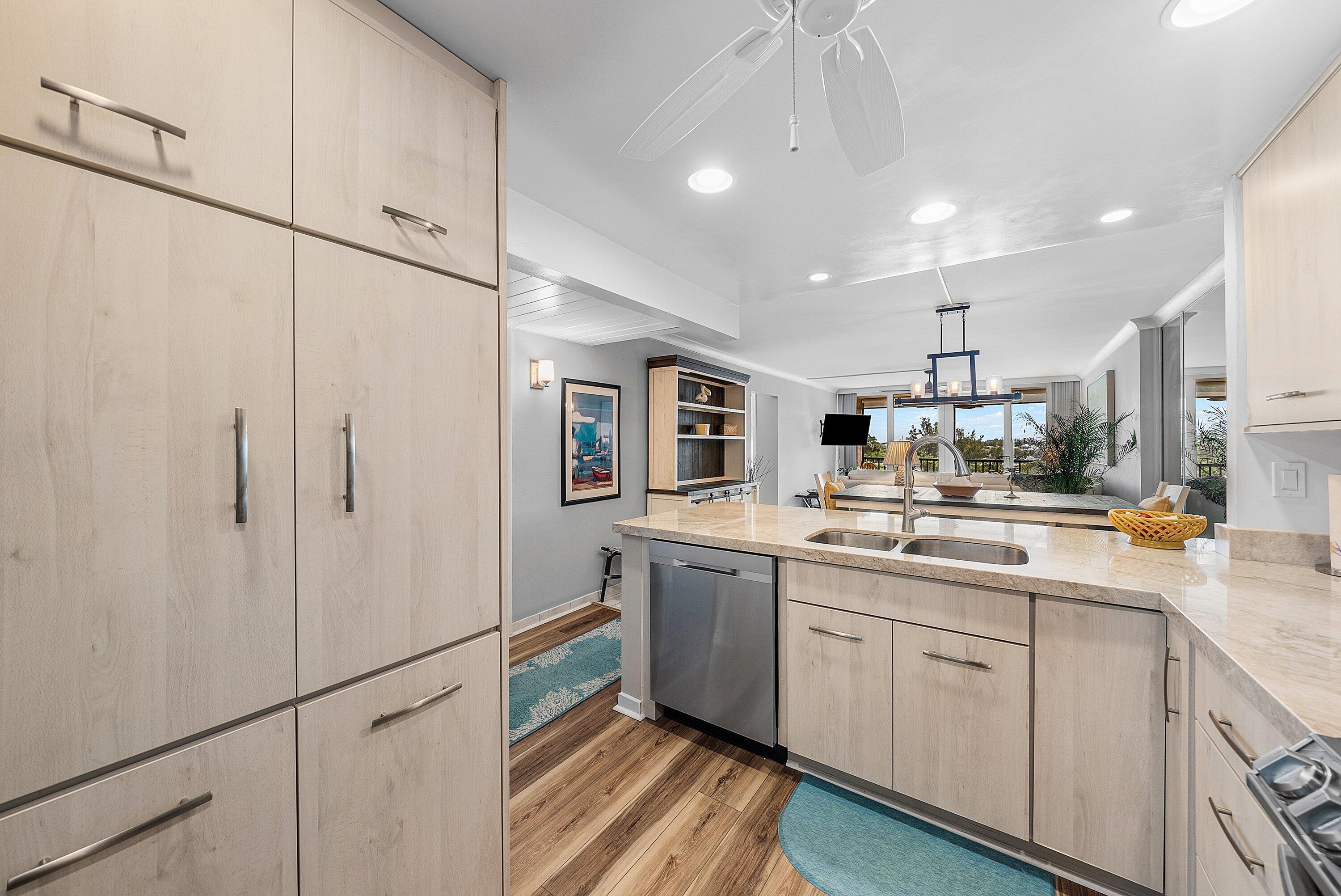 7 Royal Palm Way, Unit 507 Boca Raton, FL 33432 - Photo 8 of 47 a kitchen with counter top space and appliances