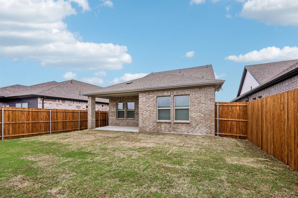 1721 Arches Road Anna, TX 75409 - Photo 38 of 39 a front view of a house with a yard