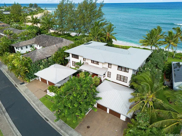 an aerial view of a house with a garden