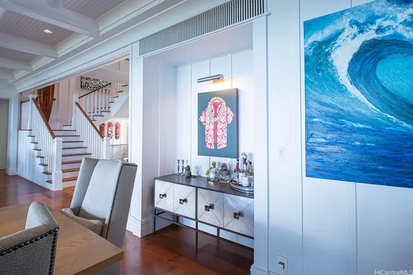 a room with furniture and wooden floor