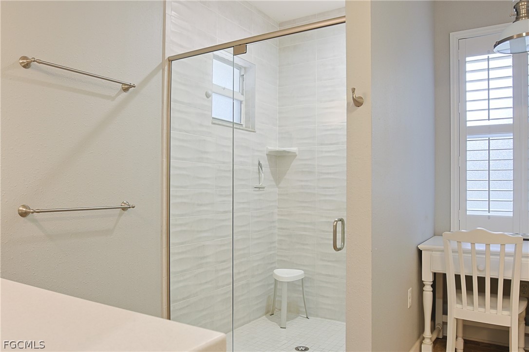 21531 Pearl Street Alva, FL 33920 - Photo 17 of 41 a bathroom with a shower and a toilet