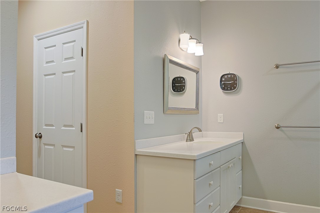 21531 Pearl Street Alva, FL 33920 - Photo 18 of 41 a bathroom with a sink and a mirror