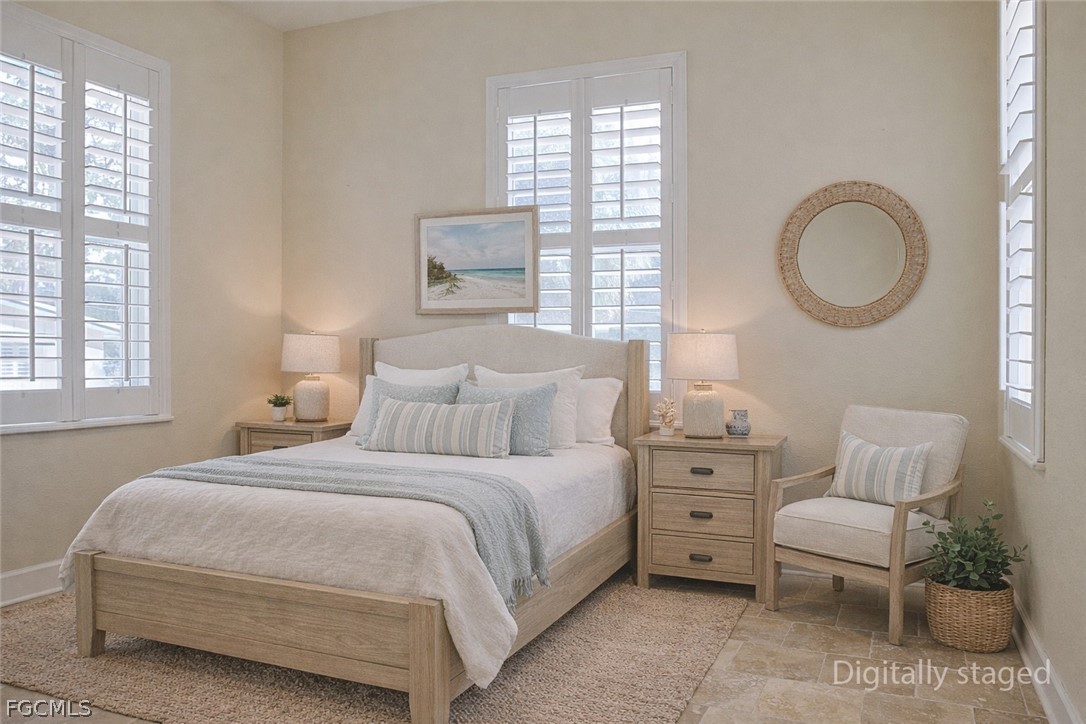 21531 Pearl Street Alva, FL 33920 - Photo 22 of 41 a bedroom with a bed and a window