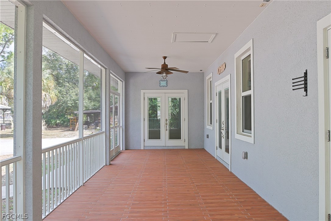 21531 Pearl Street Alva, FL 33920 - Photo 25 of 41 a view of a hallway with windows