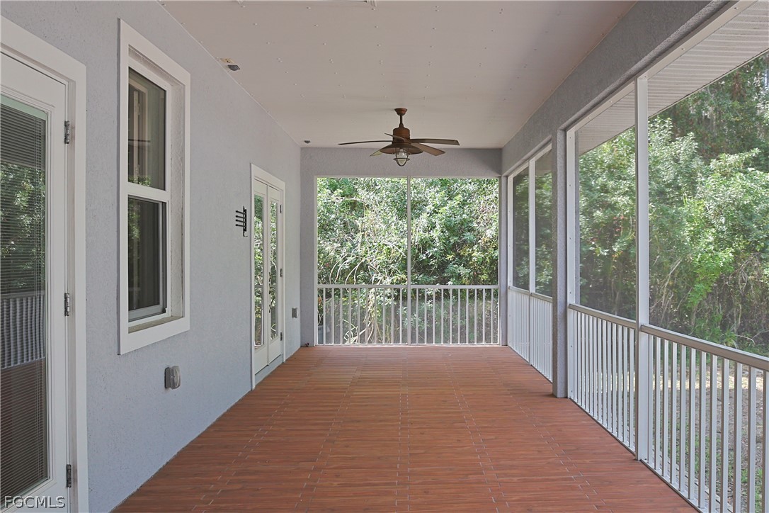 21531 Pearl Street Alva, FL 33920 - Photo 26 of 41 a view of a balcony with wooden floor