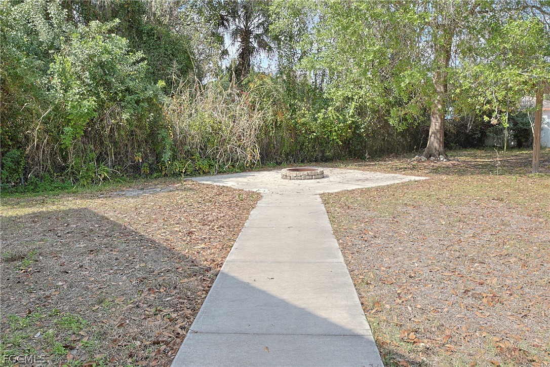21531 Pearl Street Alva, FL 33920 - Photo 34 of 41 a view of backyard with green space