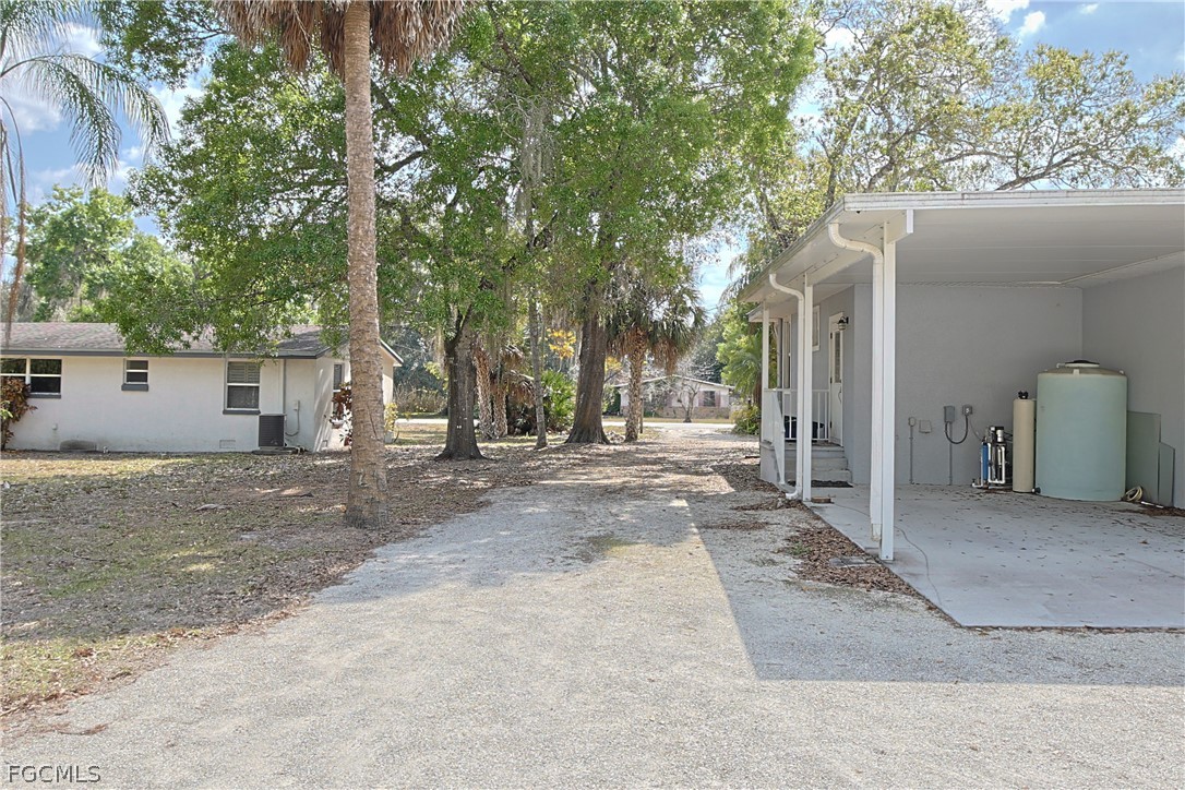 21531 Pearl Street Alva, FL 33920 - Photo 35 of 41 a view of a house with a backyard