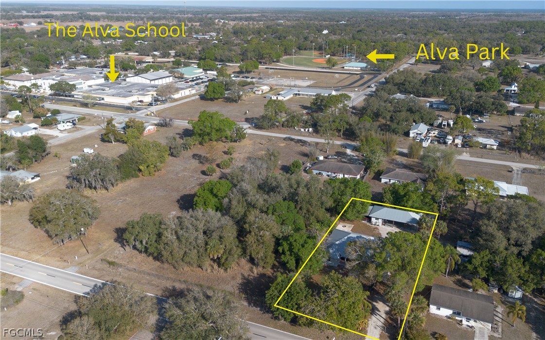 21531 Pearl Street Alva, FL 33920 - Photo 40 of 41 an aerial view of residential houses with outdoor space
