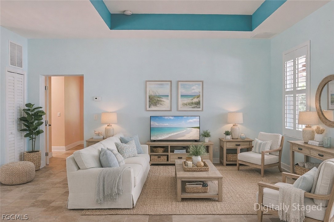 21531 Pearl Street Alva, FL 33920 - Photo 7 of 41 a living room with furniture and a potted plant