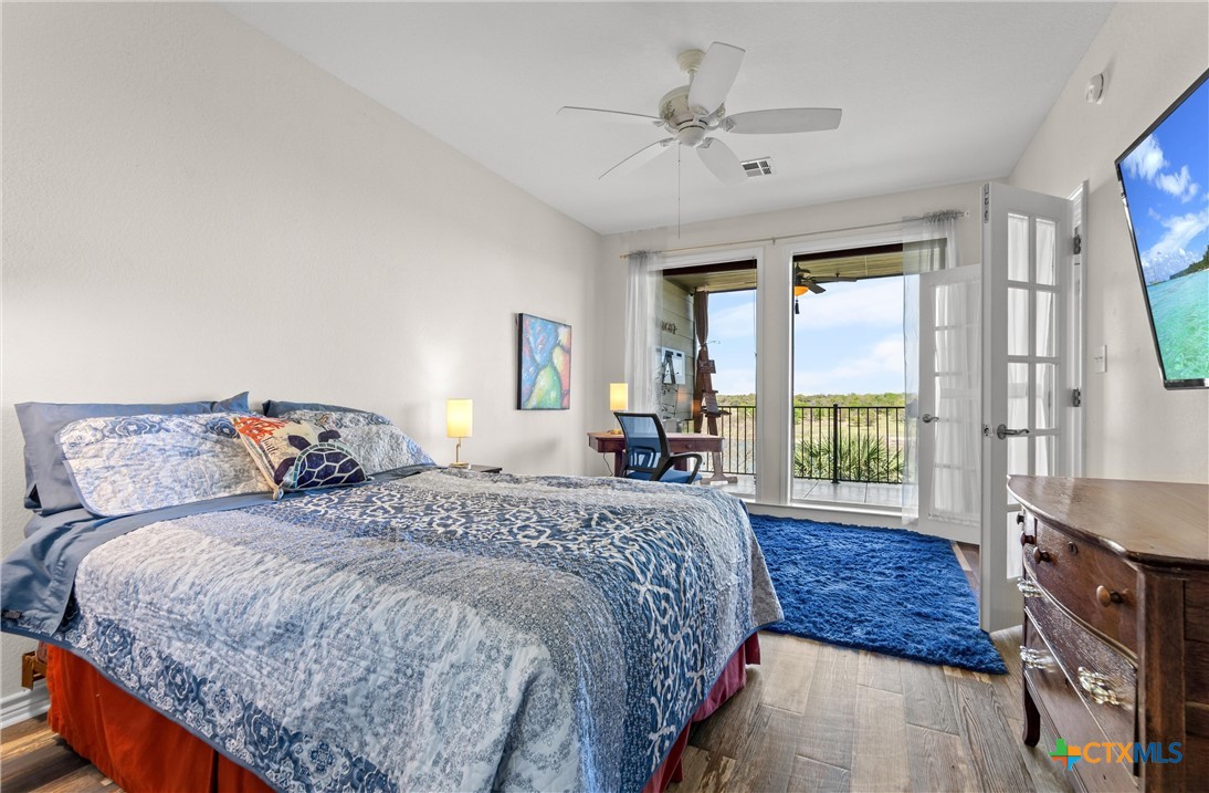 130 Sobrante Road, Unit 209 Belton, TX 76513 - Photo 12 of 36 a bedroom with a large bed and a window