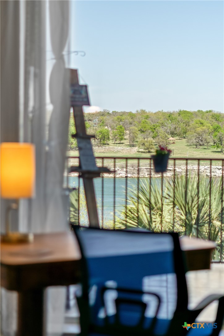130 Sobrante Road, Unit 209 Belton, TX 76513 - Photo 16 of 36 a view of a balcony with chairs