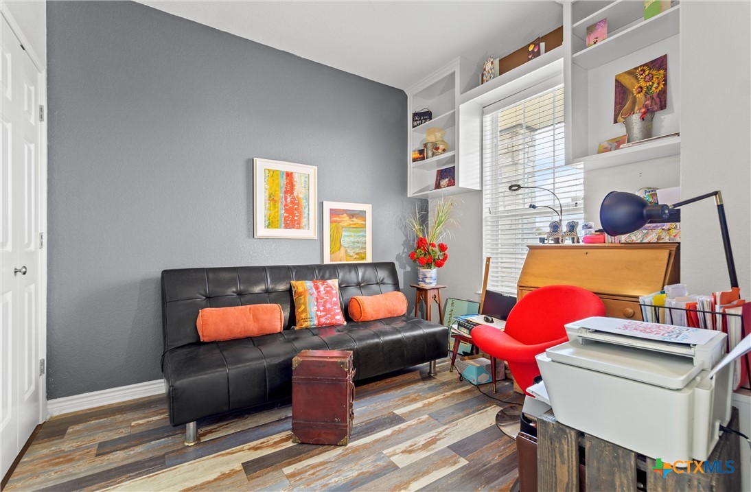 130 Sobrante Road, Unit 209 Belton, TX 76513 - Photo 22 of 36 a living room with furniture a rug and a window