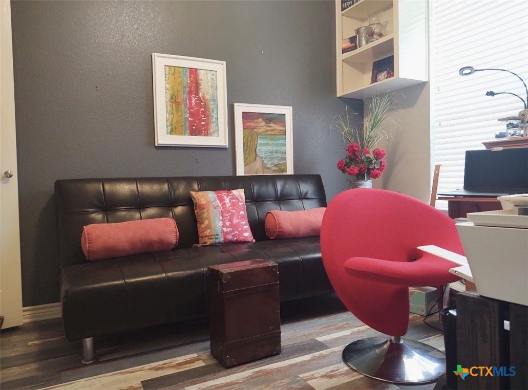 130 Sobrante Road, Unit 209 Belton, TX 76513 - Photo 23 of 36 a living room with furniture