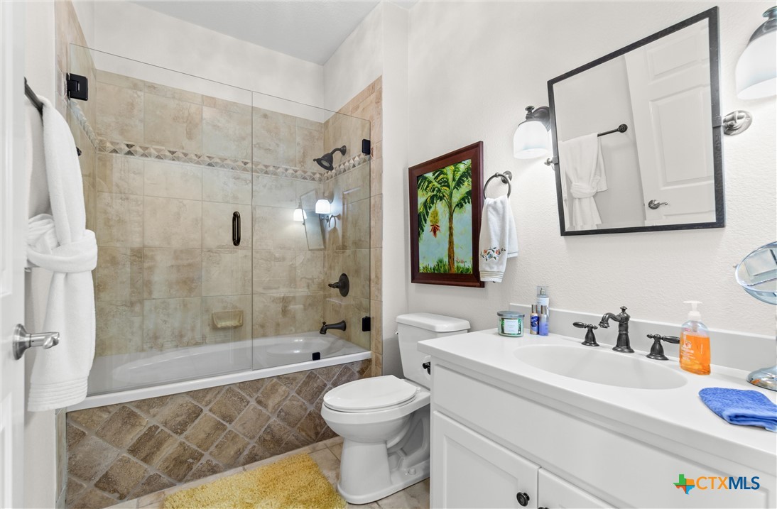 130 Sobrante Road, Unit 209 Belton, TX 76513 - Photo 24 of 36 a bathroom with a sink a toilet and shower