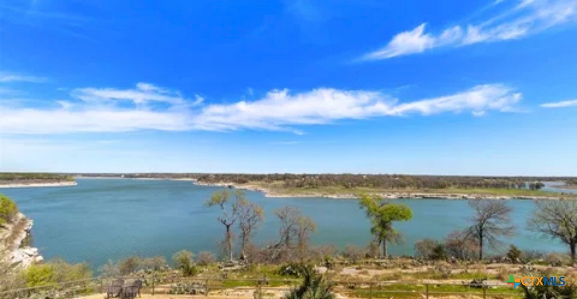 130 Sobrante Road, Unit 209 Belton, TX 76513 - Photo 30 of 36 a view of a lake with an outdoor space