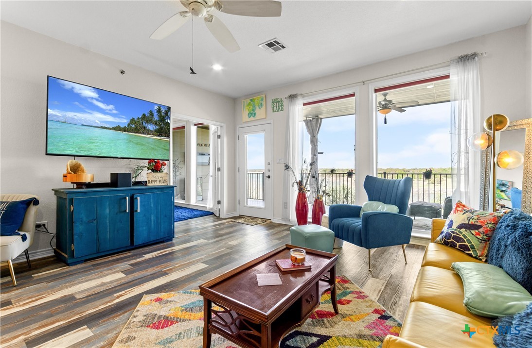 130 Sobrante Road, Unit 209 Belton, TX 76513 - Photo 6 of 36 a living room with furniture and a flat screen tv