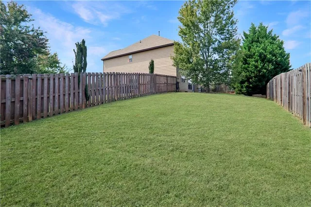 a view of a backyard with a garden