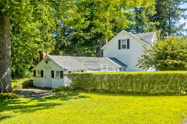 a view of a house with a swimming pool