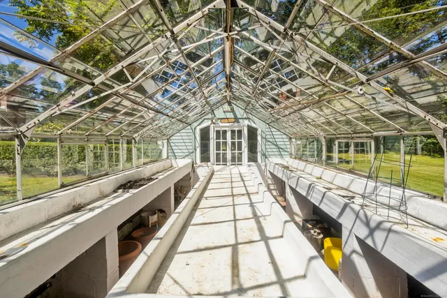 a view of swimming pool with a balcony