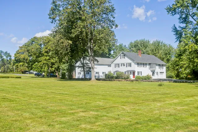 a house view with a garden space