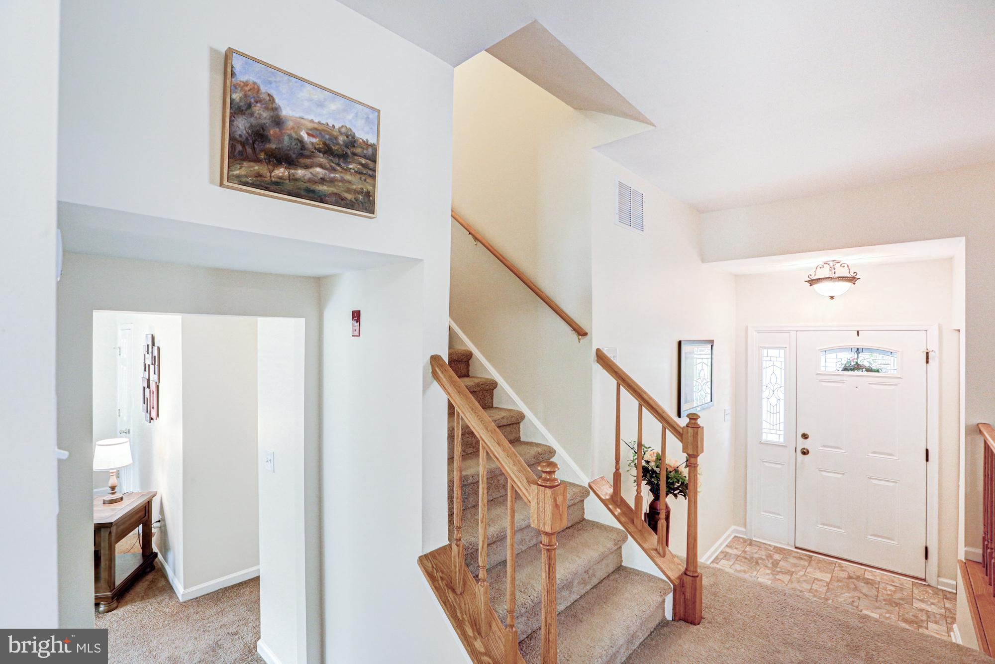 6 3 Rivers Drive Newark, DE 19702 - Photo 32 of 63 Welcoming entry with elegant staircase.