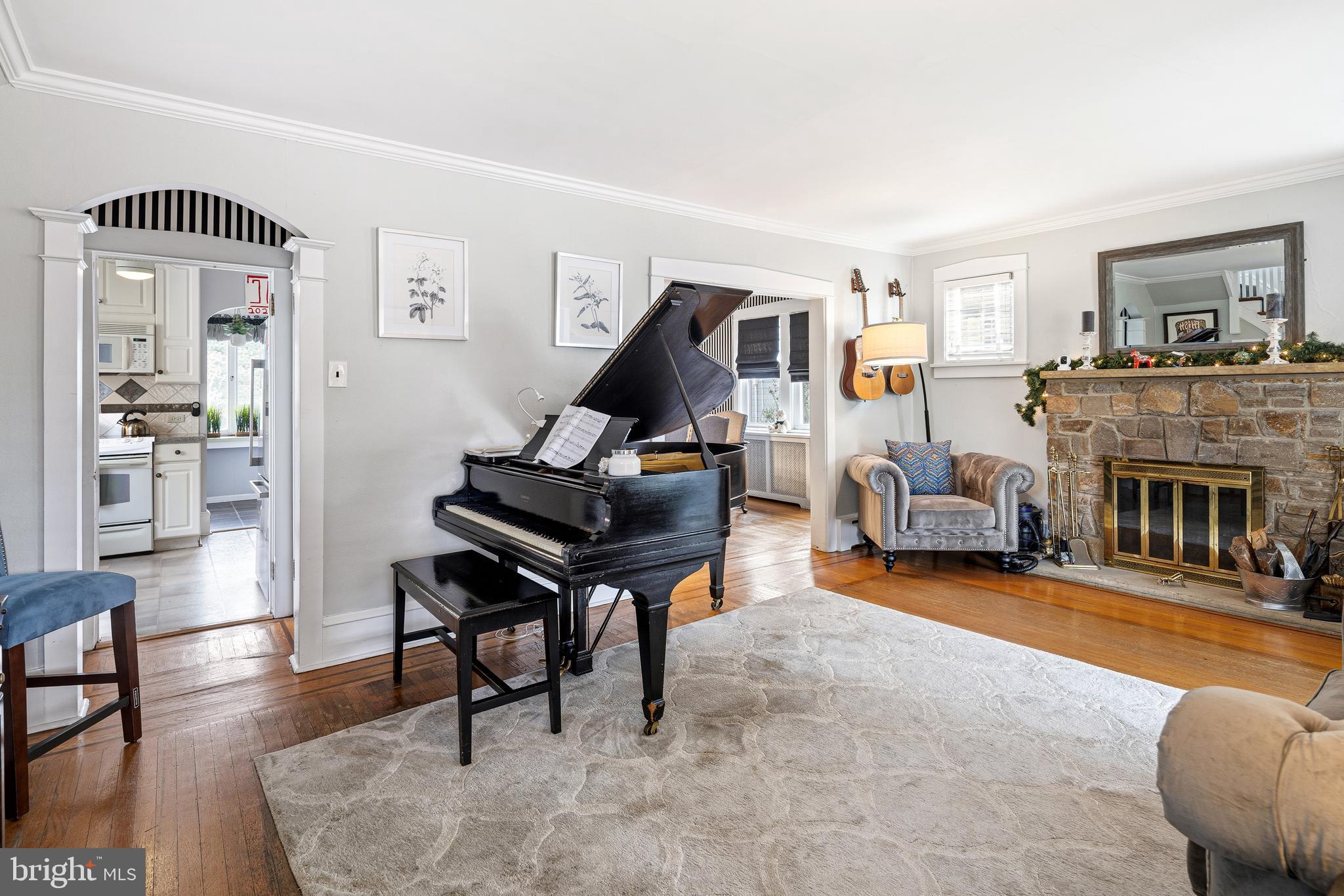 256 Hawthorne Avenue Haddonfield, NJ 08033 - Photo 2 of 17 a living room with furniture and a fireplace