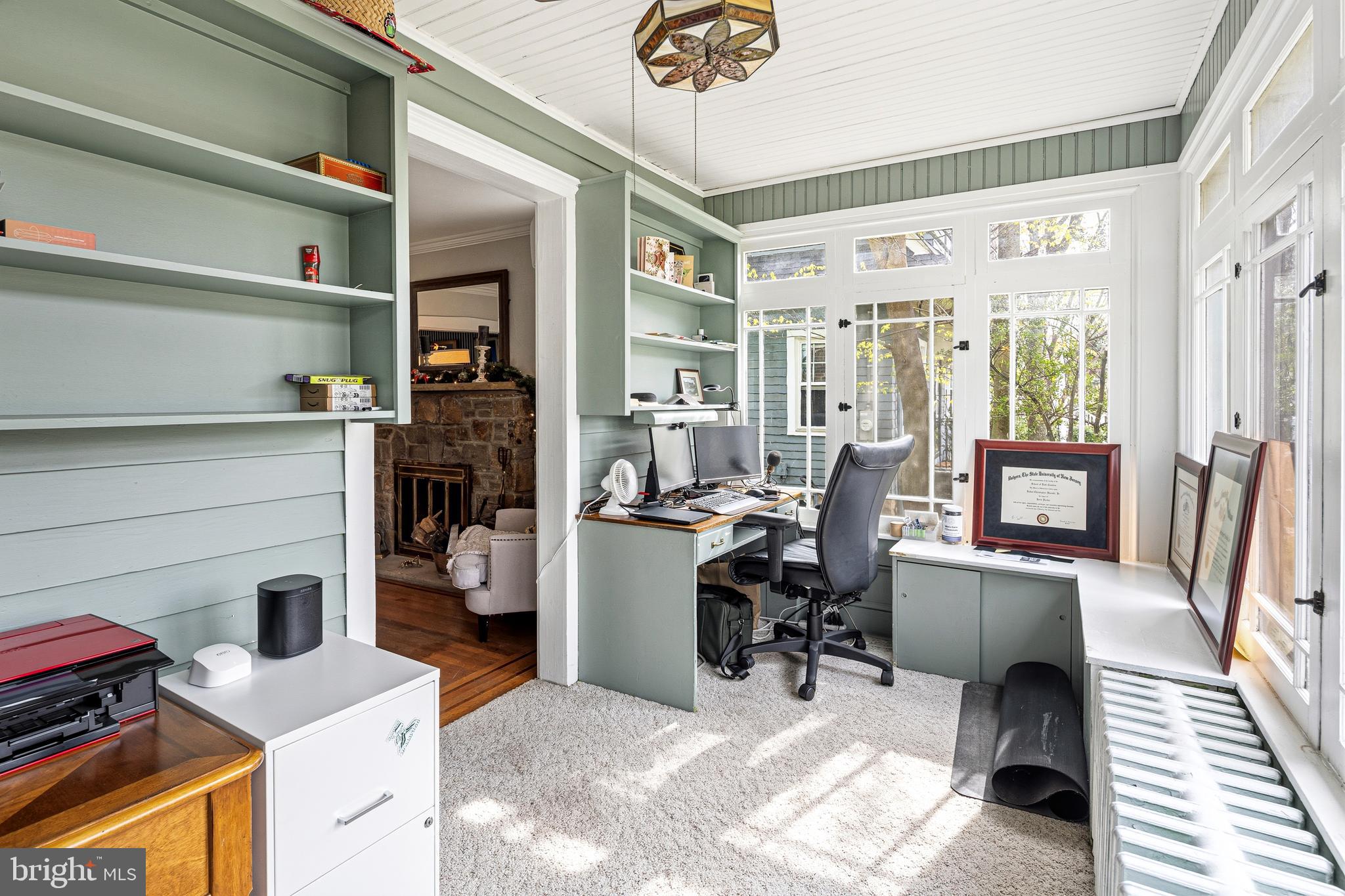 256 Hawthorne Avenue Haddonfield, NJ 08033 - Photo 5 of 17 a view of a livingroom with workspace and a window