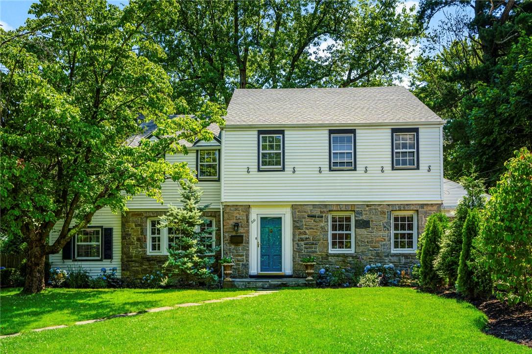 99 Aberfoyle Road New Rochelle, NY 10804 - Photo 1 of 1 a front view of a house with a yard and trees