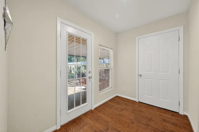 a bed room with a bed and a window