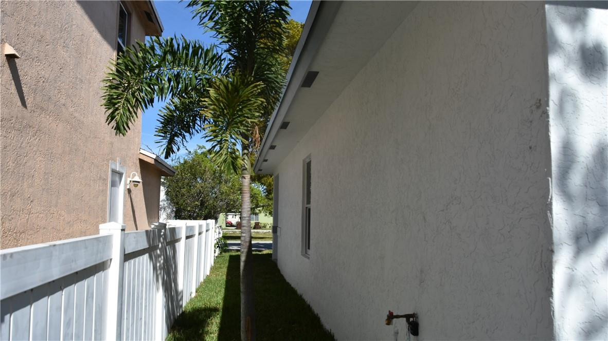 2246 Raleigh Street Hollywood, FL 33020 - Photo 6 of 40 West side of house